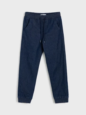 Sinsay - Jeansy jogger z efektem sprania - granatowy