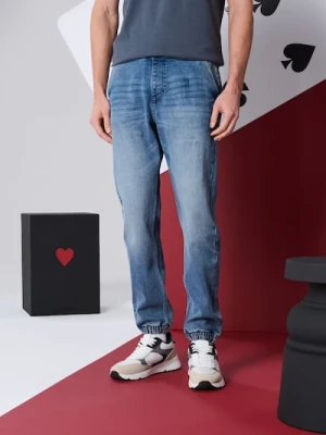 Sinsay - Jeansy jogger z efektem sprania - niebieski