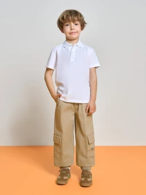 Sinsay - Jeansy jogger z kieszeniami cargo - beżowy