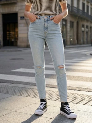 Sinsay - Jeansy mid waist skinny z surowym wykończeniem nogawek - niebieski