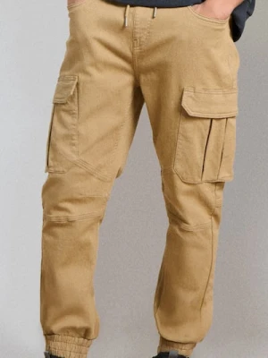 Sinsay - Jeansy regular jogger cargo - żółty