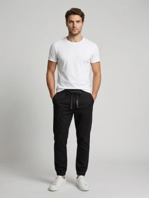 Sinsay - Jeansy regular jogger z efektem sprania - czarny