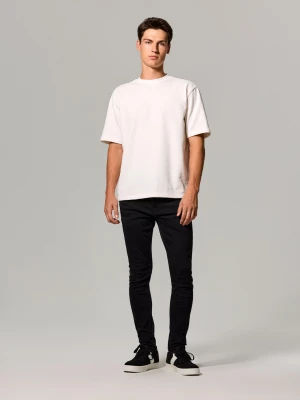 Sinsay - Jeansy skinny z efektem sprania - czarny