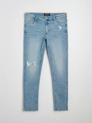 Sinsay - Jeansy slim fit z przetarciami i efektem sprania - niebieski