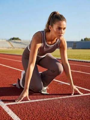 Zdjęcie produktu Sinsay - Legginsy flare z kontrastową lamówką Gym Hard - brązowy