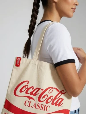 Sinsay - Materiałowa torba shopper z nadrukiem Coca Cola - kremowy
