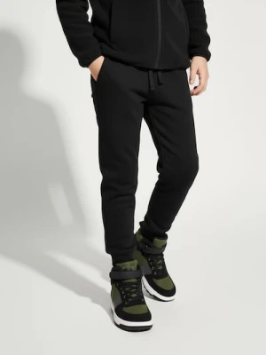 Sinsay - Ocieplane spodnie jogger - czarny