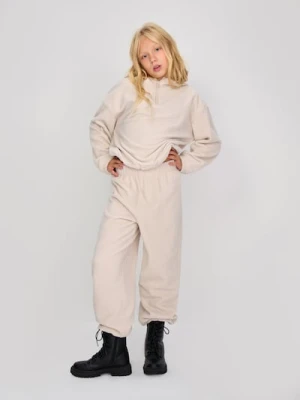 Sinsay - Polarowe spodnie ze ściągaczami - beżowy