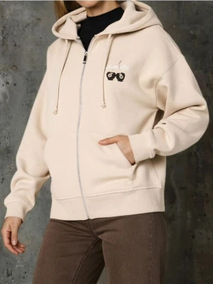 Sinsay - Rozpinana bluza z kapturem - beżowy