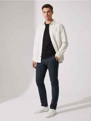 Sinsay - Spodnie chino slim - niebieski