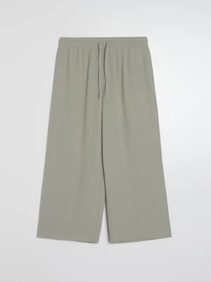 Sinsay - Spodnie culotte z kieszeniami - zielony