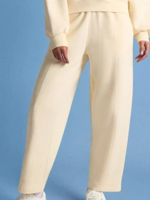 Sinsay - Spodnie dresowe barrel - żółty