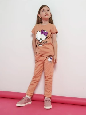 Sinsay - Spodnie dresowe Hello Kitty - pomarańczowy