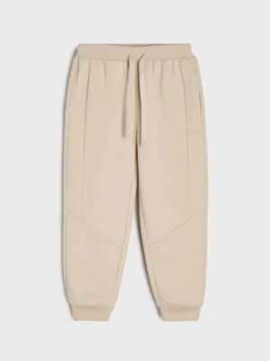 Sinsay - Spodnie dresowe jogger - beżowy