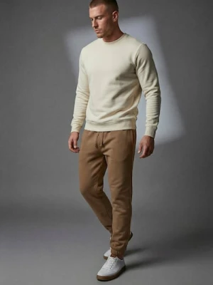 Sinsay - Spodnie dresowe jogger - brązowy