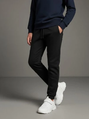 Sinsay - Spodnie dresowe jogger - czarny
