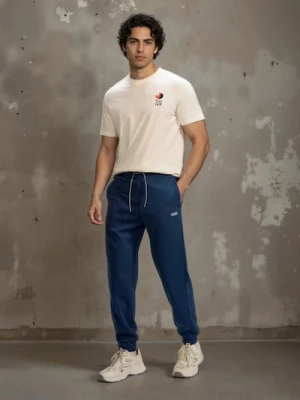 Sinsay - Spodnie dresowe jogger - niebieski