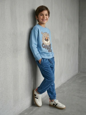 Sinsay - Spodnie dresowe jogger oversize optic wash - niebieski
