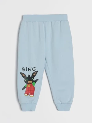Sinsay - Spodnie dresowe jogger z nadrukiem Bing - błękitny