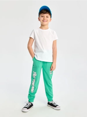 Sinsay - Spodnie dresowe jogger - zielony