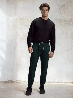 Zdjęcie produktu Sinsay - Spodnie dresowe jogger - zielony