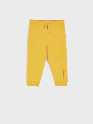 Sinsay - Spodnie dresowe jogger - żółty
