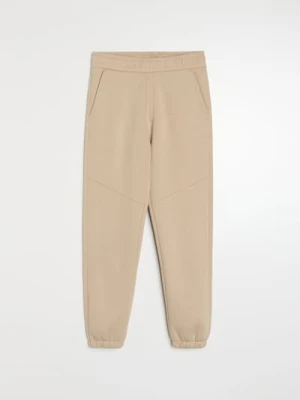 Sinsay - Spodnie dresowe regular fit - beżowy