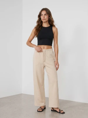 Sinsay - Spodnie dresowe wide leg - beżowy