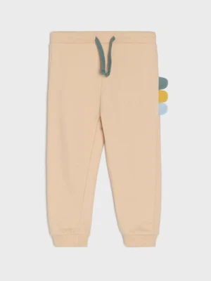 Sinsay - Spodnie dresowe z elementami 3d - beżowy