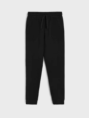 Sinsay - Spodnie dresowe z kieszeniami - czarny