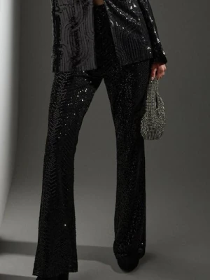 Sinsay - Spodnie dzwony z połyskującymi cekinami - czarny