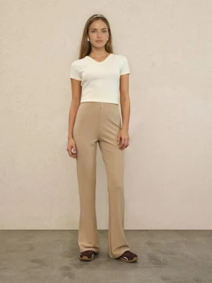 Sinsay - Spodnie flare - beżowy