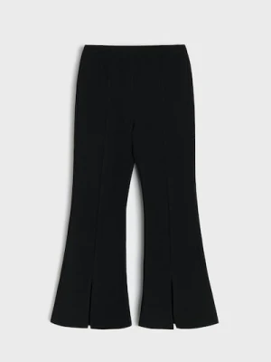 Sinsay - Spodnie flare z ozdobnymi rozcięciami - czarny