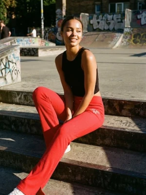 Sinsay - Spodnie flare z ozdobnymi rozcięciami - czerwony