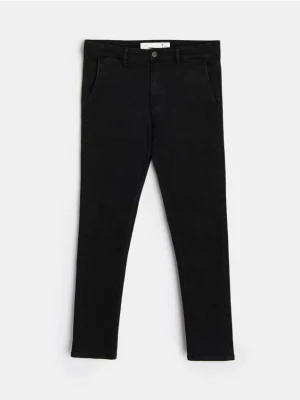 Sinsay - Spodnie jeansowe chino slim fit - czarny