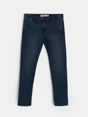 Sinsay - Spodnie jeansowe chino slim fit - niebieski