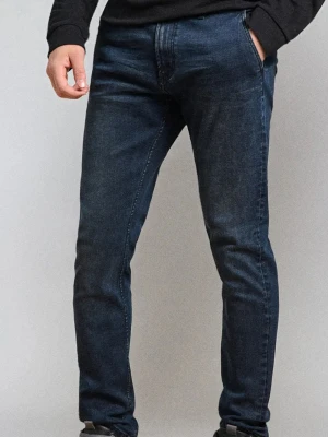 Sinsay - Spodnie jeansowe chino slim fit - niebieski
