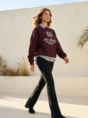 Sinsay - Spodnie jeansowe flare - czarny