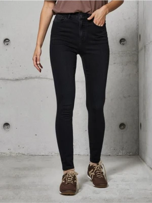 Sinsay - Spodnie jeansowe skinny - czarny