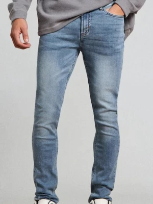 Sinsay - Spodnie jeansowe super skinny - niebieski