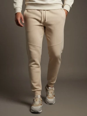 Sinsay - Spodnie jogger dresowe pique - beżowy