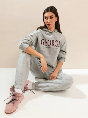 Sinsay - Dresowe spodnie jogger z napisem GEORGIA - szary