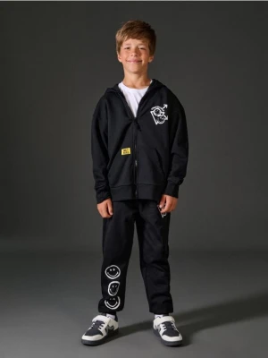 Sinsay - Spodnie jogger Smiley - czarny