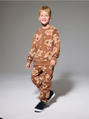 Sinsay - Spodnie jogger z motywem świątecznym - brązowy