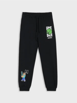 Sinsay - Spodnie jogger z nadrukiem Minecraft - czarny