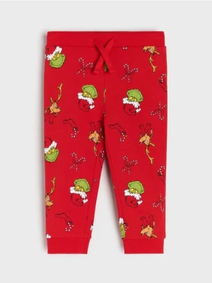 Sinsay - Spodnie jogger ze wzorem Grinch - czerwony