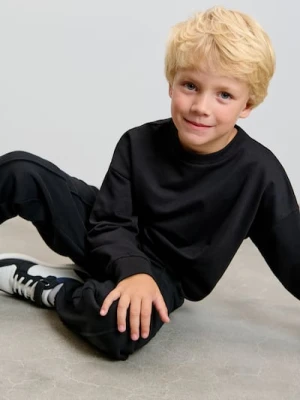 Sinsay - Spodnie loose z ozdobnymi przeszyciami - czarny