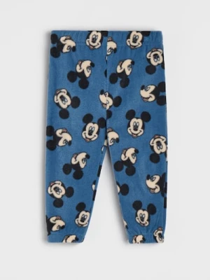 Sinsay - Spodnie polarowe z nadrukiem Mickey Mouse - niebieski