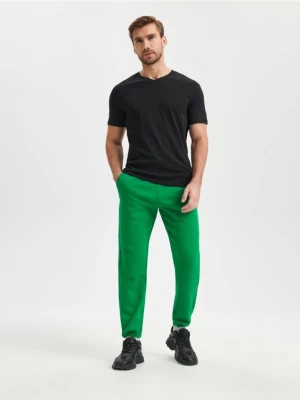 Sinsay - Spodnie regular jogger - zielony