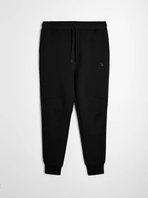 Sinsay - Spodnie tapered fit SNSY PERFORMANCE - czarny